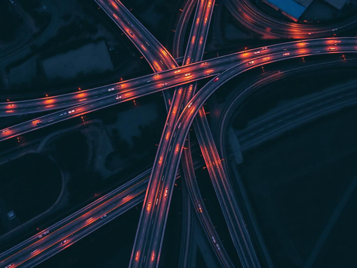 Aerial view of a highway interchange at dusk